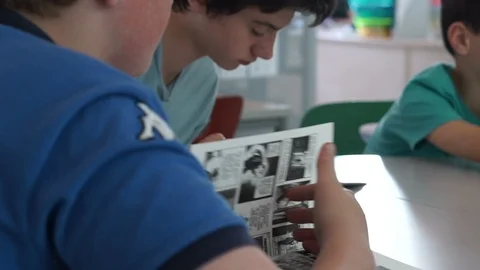 Child Reading Book in Library 库存影片 87202227