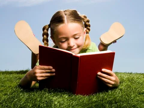 Child reading a book. Stock Photos