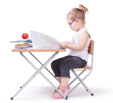 Child reading a book Stock Photos