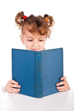 Child reading book Stock Photos