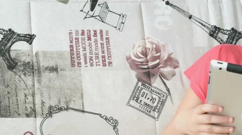 Child reading a digital tablet lying on the bed Stock-Footage 64541353