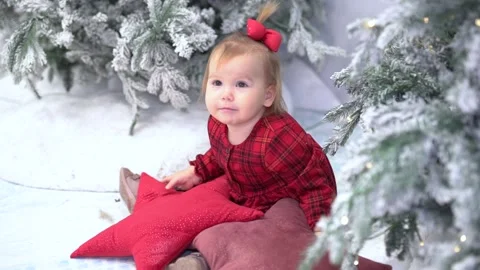 Child  with red star pillows Stock Footage 224936131
