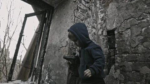 Child refugee with arms. War. Stock Footage 90446583