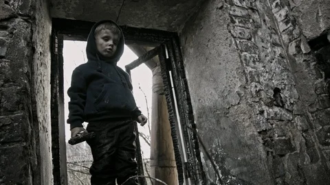 Child refugee with arms. War. Stock Footage 90447267