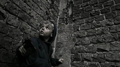 Child refugee with arms. War. Stock Footage 90448015