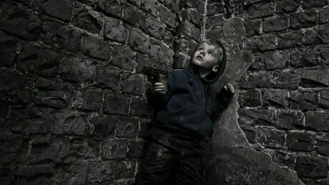 Child refugee with arms. War. Stock Footage 90448271