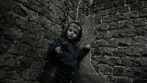 Child refugee with arms. War. Stock Footage 90448680