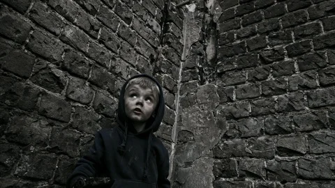 Child refugee with arms. War. Stock Footage 90449222