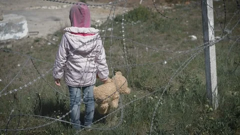 A child in a refugee camp Stock Footage 116115815