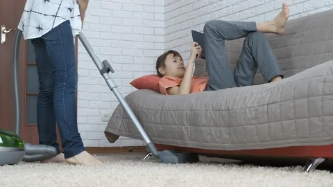The child refuses to help the mother. Stock Footage 111480678