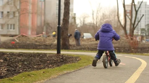 A child rides the bicycle Stock Footage 48541824