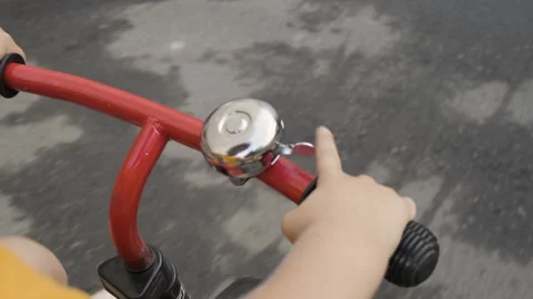 The child rides a bicycle while driving. Stock Footage 172014376