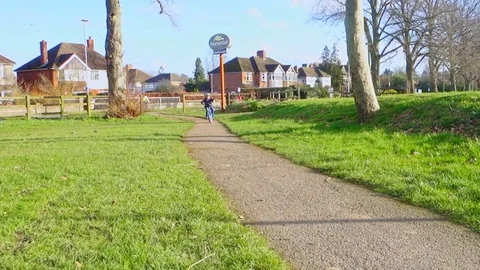 Child riding bicycle Stock Footage 124485808