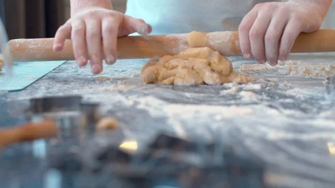 Child rolling dough Stock Footage 124950104