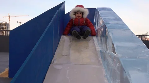 The child rolls down the hill Stock Footage 86732228