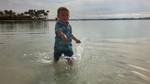 Child run on the water Stock Footage 71352215