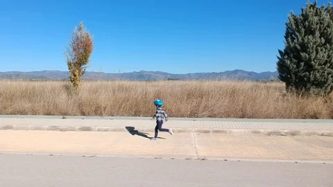 Child running and playing while having fun Video stock 124744025
