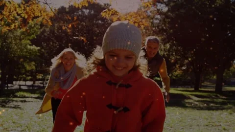 Child running to camera, parents chasing trying to catch during family play Stock Footage 333397112