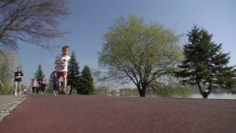 Child running competition Stock Footage 74023467