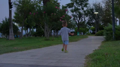 The child is running in the park Stock Footage 282794958