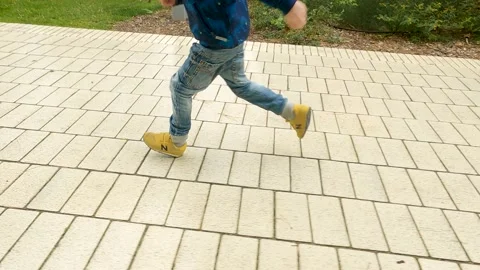 Child running in slow motion Stock Footage 160501042