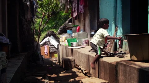Child running in the slum Stock Footage 63555828