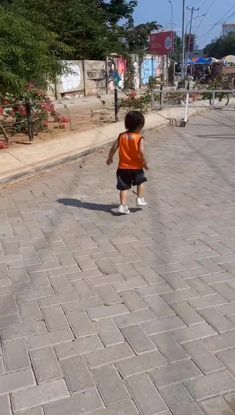Child running on the street Stock Footage 232363395