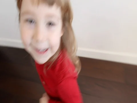 Child running through corridor at home Stock Footage 73103153