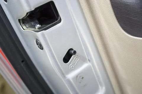 This child safety lock is one of the security features on the car Stock Photos