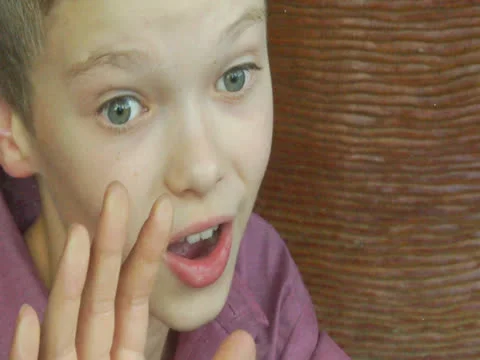 Child says something at seeing outside of his house Stock Footage 22919533