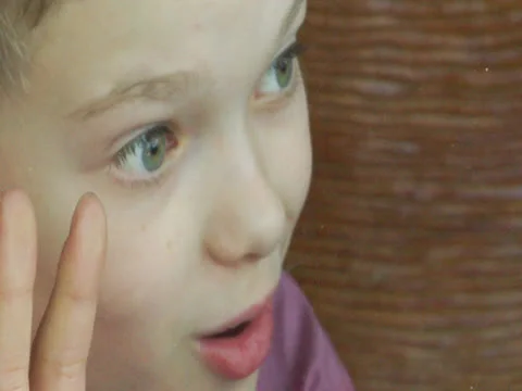 The Child says wow at looking something Stock Footage 22919336