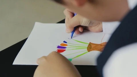 Child at school drawing and writing Stock Footage 80274001