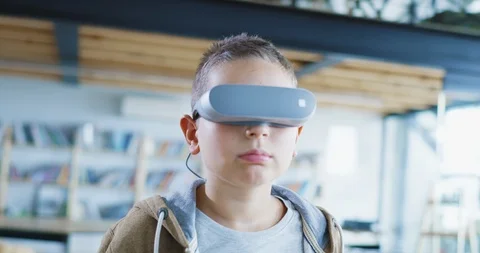 Child School Student Attending Interactive VR Lesson In A Classroom Education Stock Footage 100737438