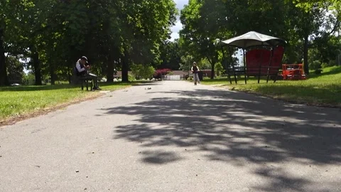 Child on Scooter in Park Stock Footage 131983146
