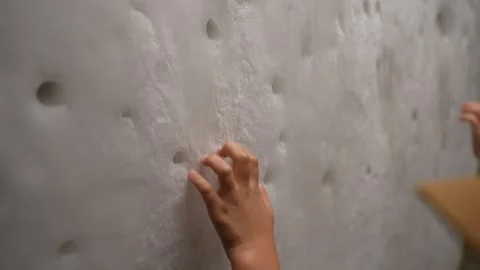 Child Scratching an Ice Wall With Hands Stock Footage 346326525