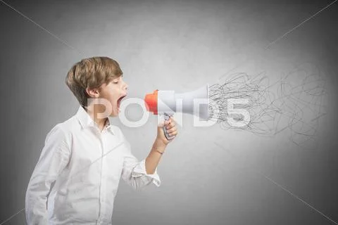 Child screaming on the megaphone Stock Photos