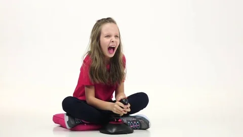 Child screaming playing on console in online games. Slow motion Stock Footage 75929176