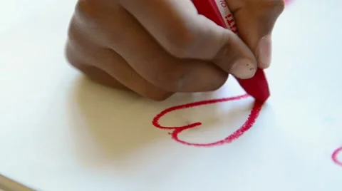 Child scribbling heart shape Stock-Footage 54488105