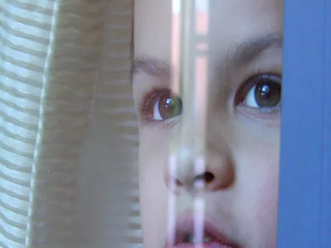 The Child is seeing something from a window Stock Footage 22918826