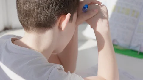 Child self-studying at home during epidemc, distance studying Stock Footage 128241243
