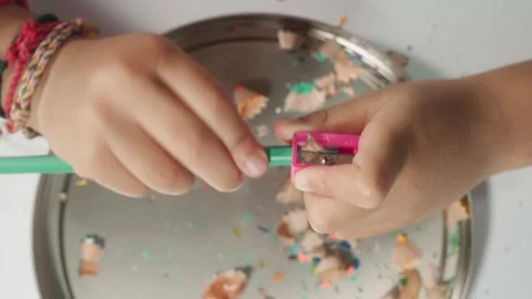 Child Sharpening Colored Pencil by Hand, Developing Fine Motor Skills and R.. Stock-Footage 342577391