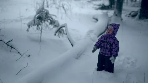 A child with a shovel in the winter. Stock Footage 80232225