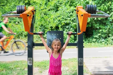Child on simulators in the park Stock Photos