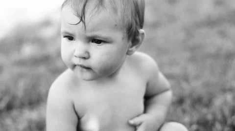 A child sits on a magical glade Stock Footage 50259172