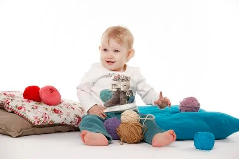The child sits Stock Photos