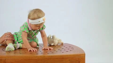 Child Sits On The Table Video stock 52519294