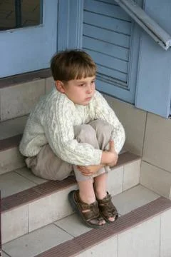 Child sitting alone Stock Photos