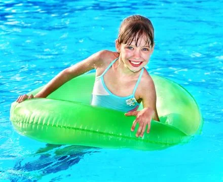 Child sitting on inflatable ring . Stock Photos