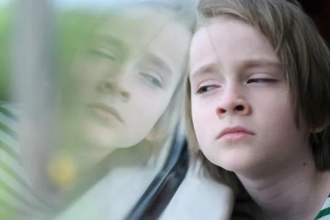 The child sitting in the train Stock Photos