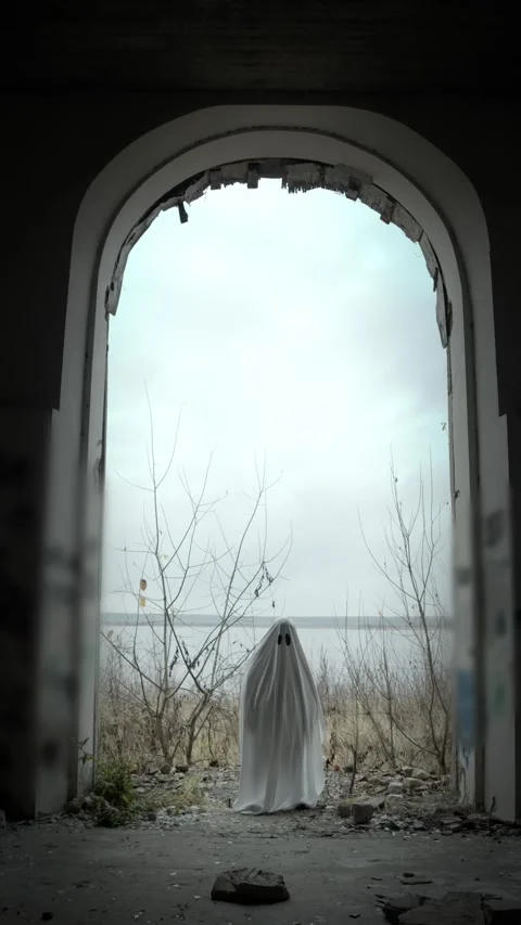 Child-size ghost waits on threshold of ruined mansion, vast archway and river Stock Footage 320248436